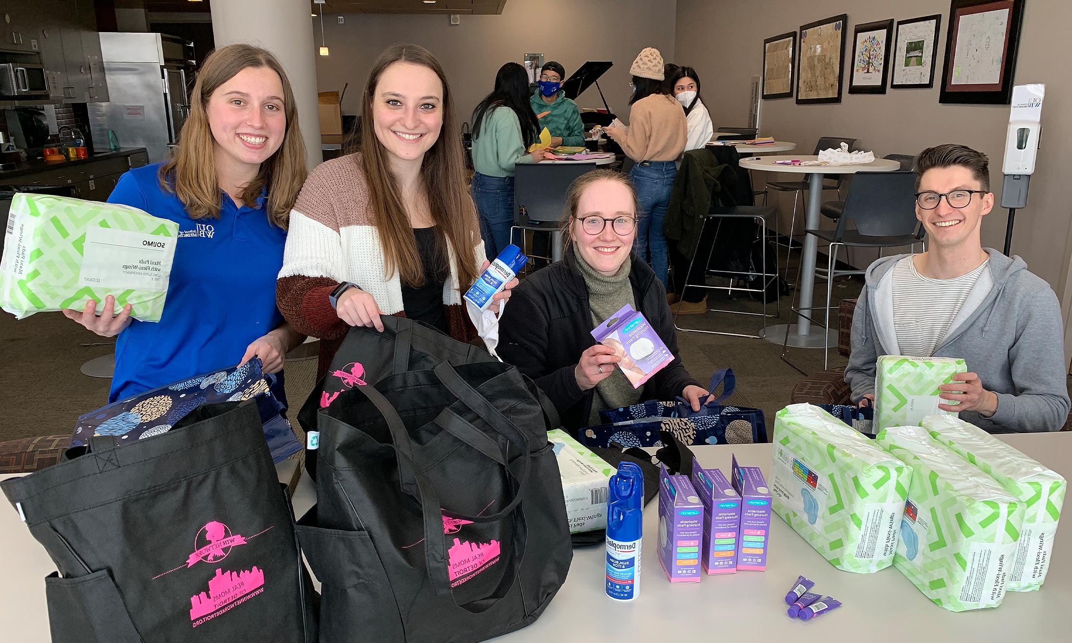 An image of students preparing care packages.